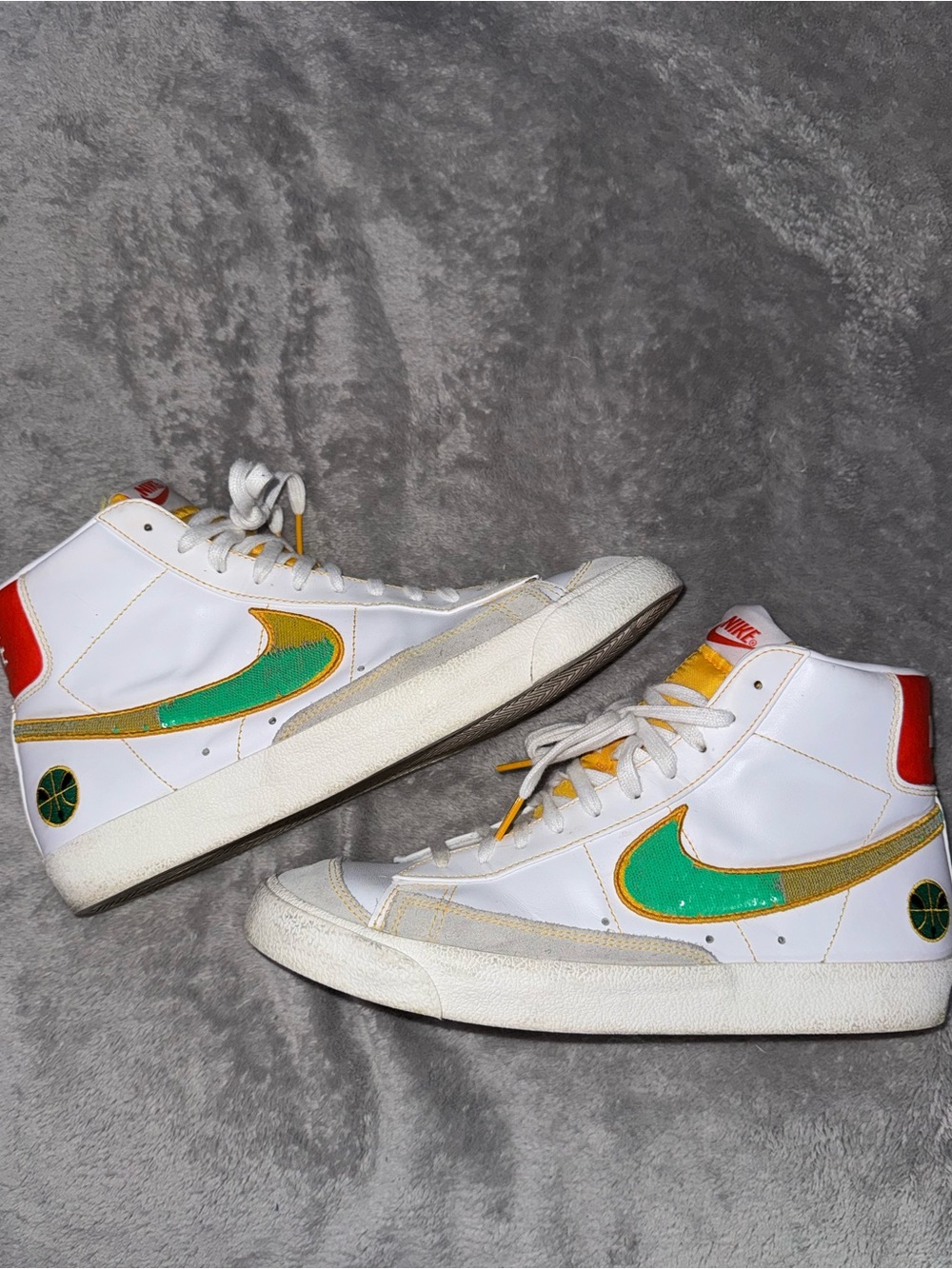Nike White High-Top Sneakers with Yellow Tongue and Orange Logo